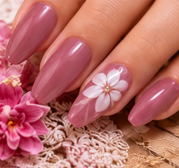 Mauve dip nails with a white flower